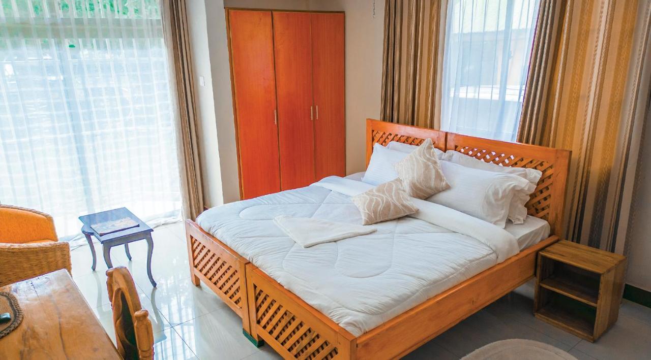 Runako Lodge Arusha Quarto foto